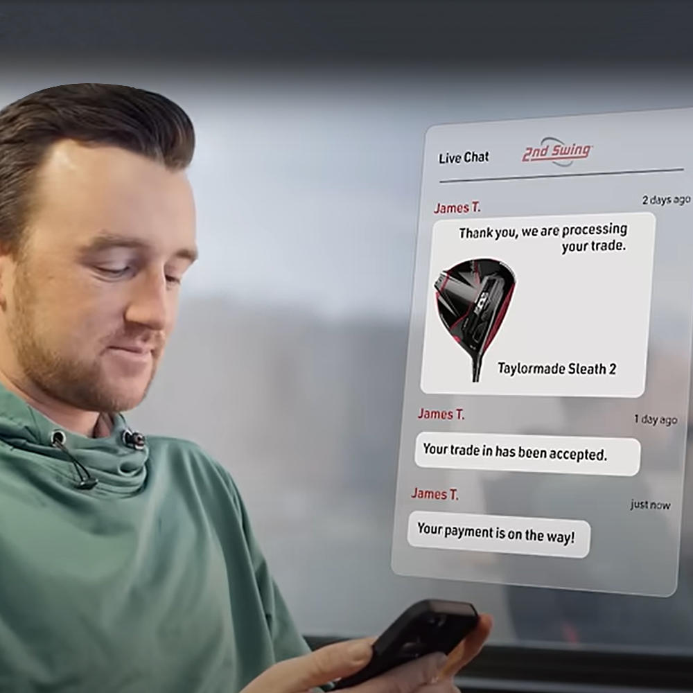 image of a handsome young man looking at his phone